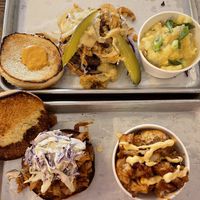 Orange bird sandwich with bbq cauliflower and brew burger with potatoes   at Dharma Southern Chick'n in Orlando