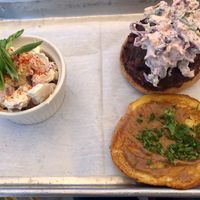 Orange bird with a side of potato salad at Dharma Southern Chick'n in Orlando