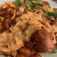 Vegan hot dogs with Indian spiced chili and cheese 🤘🏼 at Dharma Southern Chick'n in Orlando