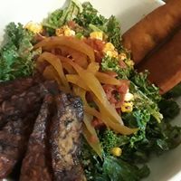 Hail kale salad with bbq seitan bacon at Dharma Southern Chick'n in Orlando