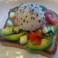 Avocado toast with poached egg   at Veggie Grill by Next Level - Tustin Marketplace in Irvine