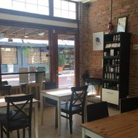 Light, open, comfortable space to sip tea or a delicious smoothie. at Green Cup Cafe in Fort Myers