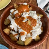 Potatoes with mayonaise and spicy sauce  at kVegan in Tenerife