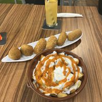 Croquetas mixed plate with all three flavours (pak Choi &Curry; red peppers; shiitake) & Patatas Bravas with vegan mayo and bravas sauce   at kVegan in Tenerife