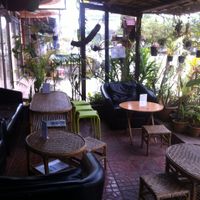 Outdoor seating at Bamboo Lounge - Forest Retreat in Luang Namtha