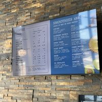 Coffee and smoothie menu, with vegan protein option for smoothies  at Pluto’s Organic Cafe in Redmond
