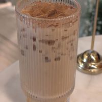 Chai latte with oat milk at Le Petit Paris Cafe Southside in Jacksonville