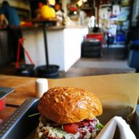 Mushroom burger with a view to the inside at Chwast Food in Warsaw