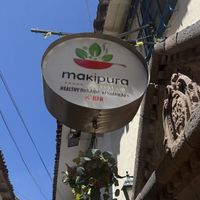 front sign  at Makipura Organic Restaurant in Cusco