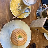 Bagel with avo and oat milk latte  at Balta Brunch - Porto in Porto