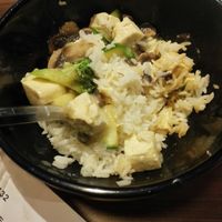 Cooked rice, tofu, mushrooms, zucchini, broccoli and garlic sauce. Yum! at Eazie - Herengracht in The Hague