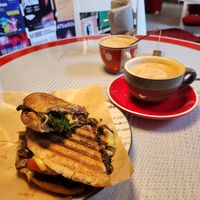 Cappuccino and hot sandwich (cheese and mushrooms) at KIRAS - Totoriu 7 in Vilnius
