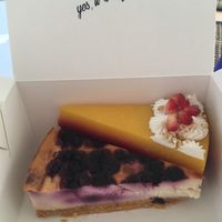Blueberry cheesecake and mango cake at KIRAS - Totoriu 7 in Vilnius