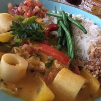 MOQUECA DE PALMITOS Butternut squash, palm hearts & spinach in a creamy coconut curry with charred red peppers, garlic & fresh tomatoes. With spring onion rice, sweet plantain, pico de gallo & a coconut farofa to sprinkle at Las Iguanas in Newcastle Upon Tyne