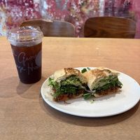 Iced coffee and vegan short rib sandwichh  at George Howell Coffee in Boston