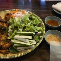Lione man plate rolls at Chay TU Dao in Da Nang