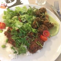 lentil curry, rice, salad and broccoli of the gods!  at Roots Kitchen in Turku