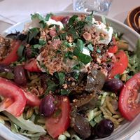 Salad with vegan lemon feta dip, aubergine, olives, beans and orzo pasta at Roots Kitchen in Turku