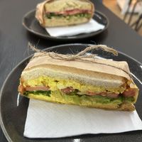 Egg sandwich and hummus sandwich (background)  at U Café  in Prague