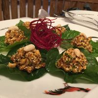 Lemongrass, herby and peanutty salad in Betel Leaves - tasty! at Khun Churn - Eathai in Bangkok