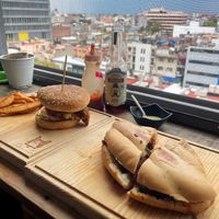 Torta de pastor (90 pesos) and burger (118 pesos inc. potato wedges)  at Vegattos in Mexico City