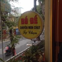 Restaurant is on the upper floor, above a market that sells religious objects related to the temple next door. at Bo De Chay - Market and Restaurant in Hanoi
