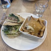 Tempeh wrap and small vegan poutine  at Pure Kitchen - Richmond Rd in Ottawa