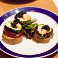 AMAZING vegan starter bites: toast + vegan spread, cashew truffle cream, beetroot, cucumber & seaweed 'caviar'. at Flax & Kale - Placa Castella in Barcelona