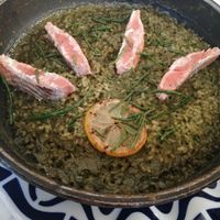 Arroz meloso con salmón salvaje y espirulina at Flax & Kale - Placa Castella in Barcelona