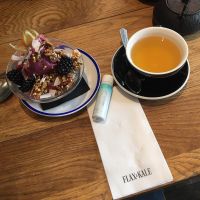 Pink Pitaya bowl and green tea at Flax & Kale - Placa Castella in Barcelona
