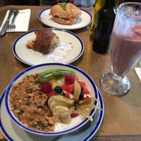 Yogurt with granola, spelt croissant, 'bacon and cheese' bagel, frozen smoothie at Flax & Kale - Placa Castella in Barcelona