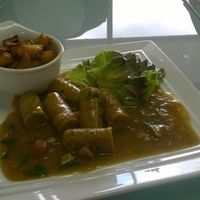 Vegan sausages in gravy with roast potatoes. at GT Organics Cafe in Christchurch