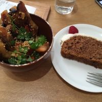 Plantain side dish and sweet potato cake with coconut frosting at Le Tricycle in Paris