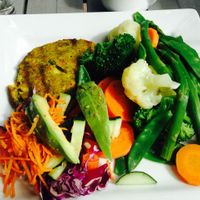 steamed vegetable platter with veggie burger  at Juice and Java in Miami Beach