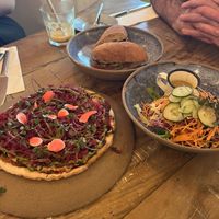 Butternut squash dough pizza gf, olive tapenade roll, salad  at Org Bistro in Rio De Janeiro