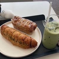 Garlic bread, cinnamon roll, and matcha latte  at The Bread Blue - Nogosan in Seoul