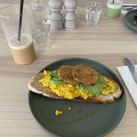 Scramble Tofu, avo & smoked tempeh  at The Lions' Den City Cafe in Norwich