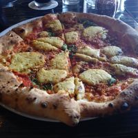 Baba with added vegan sausage. at Pizzeoli in St Louis