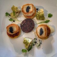 ";skallops with little potato cakes and cauliflower  at Coca Sova in Dublin