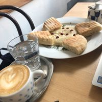 Hummus with pita and soy cappuccino at Mamacoffee in Prague