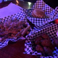 Load fries, wings and their version of a BLT  at Le Voyeur in Olympia