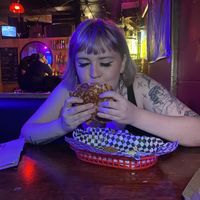 me eating the melty melt. I love this placee  at Le Voyeur in Olympia