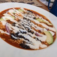 Chilaquiles con salsa roja at La Cuisine in Cozumel