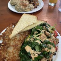 Vegan Delight with Tempeh and Vegan Buscuits and Gravy with home fries  at New Moon Cooperative Cafe in Olympia