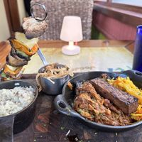 Vegan bbq platter with risotto the Mac n cheese is made with cashew fyi  at Yemanja Woodfired Grill in Oranjestad