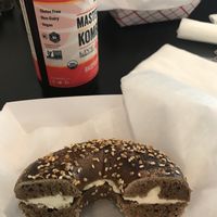 Black Russian bagel w vegan cream cheese and kombucha  at Ruthie's Bagel Dish in Highland Park