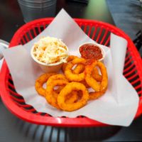 Onion rings and coleslaw at Belzepub in Prague
