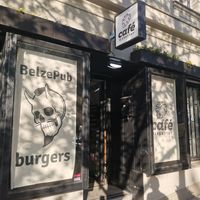 Don't be confused: This is how it looks from the outside. The pub is downstairs. Upstairs is a café and plant shop. The outside seating does not belong to the pub. at Belzepub in Prague