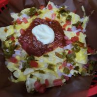 blurry loaded nachos at Belzepub in Prague