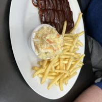 No ribs with fries and homemade coleslaw. All delicious.   at Belzepub in Prague